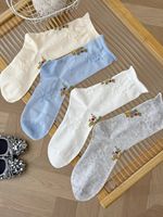 Chaussettes d'été élégantes de style français à revers lâches, en coton jacquard à motif floral, jolies chaussettes décontractées douces à fleurs pour femmes