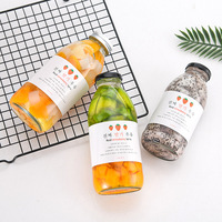 En gros 300ml 350ml 500ml 16oz clair vide ronde en verre boisson de jus de fruits potable bouteilles avec bouchon à vis en métal