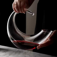 Bouteille en verre de vin de décanteur de forme irrégulière transparente caractéristique unique pour le prix d'usine de vin rouge de whisky