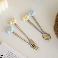 Cuillère et fourchette en acier inoxydable avec nœud créatif, finition miroir, manche en céramique, style moderne et minimaliste, pour la maison et les étudiants, idéales pour les desserts
