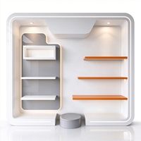 Vitrine de présentation de cosmétiques LED arquée personnalisée, modulaire, murale, pour magasin de maquillage, comptoir de présentation de cosmétiques pour boutique de beauté