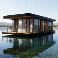 Maison flottante préfabriquée modulaire de luxe en acier léger, villa mobile, salle de bain, atelier pour les escapades en bord de lac et en montagne