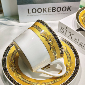 Ensemble de salle à manger de luxe nordique en or, best-seller, avec tasses et soucoupes en céramique inclinées - Product Image 4