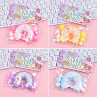 Jouets à presser en plastique à texture croustillante et intérieur souple, édition thérapeutique, en forme de donut, les plus vendus, fabricant en gros