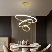 Lustre de salon moderne simple lustre atmosphérique escalier anneau lumière réseau de luxe restaurant rouge éclairage nordique