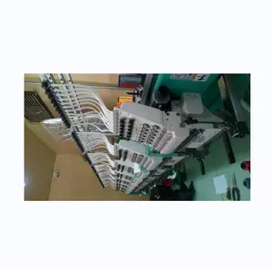 Machines à broder Tajima avec une toile de fond de fil isacorde