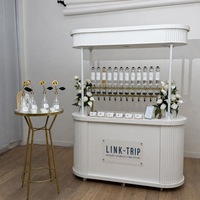Chariot de présentation de parfums mobile avec éclairage LED, logo personnalisé, présentoir pliable en MDF pour centre commercial