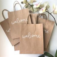 Petits sacs-cadeaux de mariage en papier kraft brun imprimés sur mesure poignées pour emballage artisanal de bougies de fête Bolsas du fabricant de vêtements