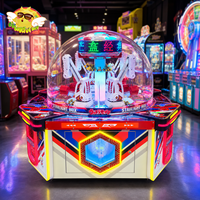 Machine de jeu d'arcade Starburst Box Island pour 4 joueurs avec dôme transparent et bras mécanique pour centres de divertissement familial