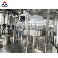 Machine de remplissage automatique d'eau pure minérale en bouteille PET, capacité 10000 BPH, pour bouteilles de 2 L