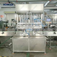 Machine de remplissage de liquide à pompe à engrenages à 6 têtes entièrement automatique pour la production d'eau purifiée, de lait et de jus d'orange