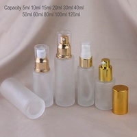 Bestseller Leere Runde 30ml 2oz Individuelle Farbige Klare Mattierte Glas-Kosmetikflasche für Creme Hautpflege Lotion mit Pumpspender