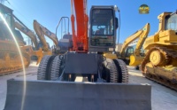 Excavatrice sur pneus Hitachi ZX130W avec peinture d'origine, moteur Isuzu, 13 tonnes, 87,2 kW, haute performance, en stock