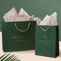 Sac cadeau jetable personnalisé en papier couché blanc avec impression offset et estampage à chaud doré pour bijoux et vêtements