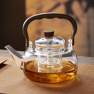 Tetera de vidrio de borosilicato alto con mango de madera, resistente al calor, para uso en el hogar y la oficina - Product Image 2