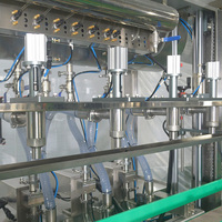 Ligne de traitement d'emballage automatique de haute qualité pour le remplissage, le bouchage et l'étiquetage des barils et bouteilles d'huile alimentaire, haute sécurité