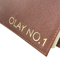Logo en métal personnalisé pâte d'or brillant sur des boîtes d'emballage de haute qualité, logo de transfert en métal brillant