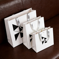 Luxury Brand Shopping Boutique Recycle <strong>Best</strong> <strong>Selling</strong> Custom logo Printing Reusable Shopping Paper Bag With Ribbon Handle