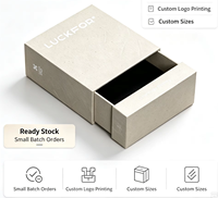 Boîte cadeau en carton ondulé écologique avec poignée, matériaux recyclés, finition mate et gaufrée pour bijoux