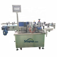 Machine d'étiquetage automatique pour bouteilles rondes en verre et en plastique pour cosmétiques