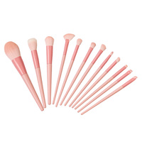 Ensemble de 12 pinceaux de maquillage vegan personnalisés avec logo de marque privée, manche en bois massif et virole en aluminium rose mat, idéal pour les cadeaux d'entreprise