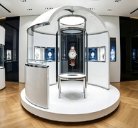 Îlot de présentation de montres de luxe autoportant en forme de dôme, vitrine en verre haut de gamme pour la vente de montres de luxe