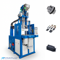 Machine de moulage par injection verticale pour connecteurs automobiles étanches avec serrage stable