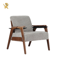 Fauteuil de style Mid-Century avec structure en bois massif et revêtement en tissu, pour salon, hôtel, ou comme canapé individuel d'appoint