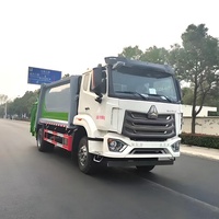 Camion Compacteur de Déchets Howo 14CBM à Prix d'Usine, Véhicule de Collecte Arrière Personnalisé, Transmission Manuelle, Moteur Diesel, Boîte de Vitesses