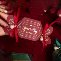 L'usine accepte les boîtes-cadeaux pliantes personnalisées en ruban de style bonbon pour vos logos personnalisés