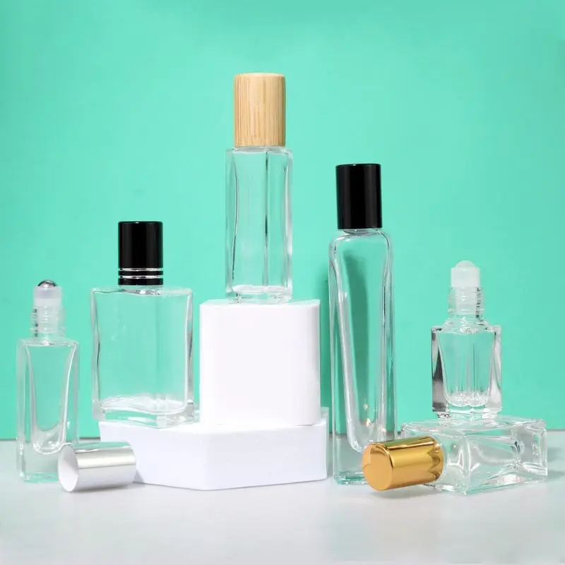 Nouveau Design Carré 3ml 5ml 10ml 15ml Petit Rouleau Clair D'huile Essentielle En Verre Rouleau Sur Bouteille D'huile De Parfum Avec Boule En Métal