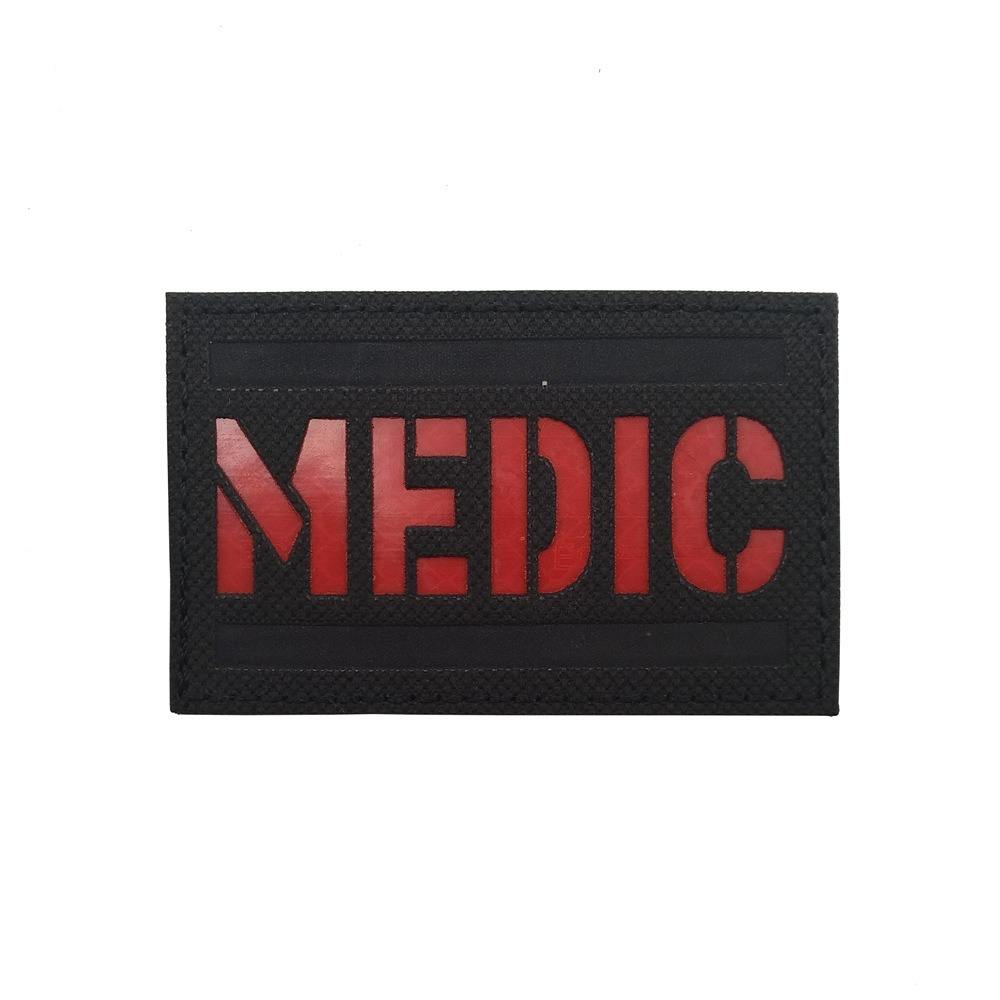 MEDICA réfléchissant (rouge sur fond noir)