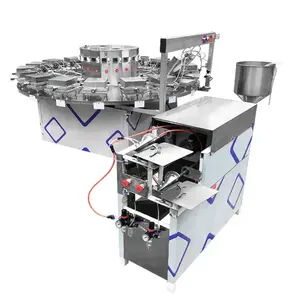 Machine automatique de fabrication de rouleaux d'oeufs en bâton de gaufrettes et de biscuits Machine de fabrication de rouleaux d'oeufs en bâton de gaufrette