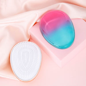 2024 nuova spazzola per parrucchieri a forma di uovo pettine per massaggio elettroplacca colorato uovo stellato per il lavaggio del pettine per capelli da donna - Product Image 4