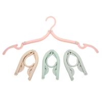 Cintres pliables portables en plastique pour organiser les vêtements et gagner de la place en voyage
