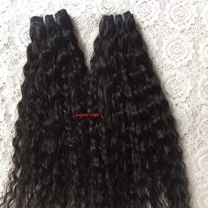 100% Extensions de cheveux bouclés indiens vierges naturels non transformés Remy Cheveux humains indiens bruts en faisceaux de vagues HD en gros - Product Image 3