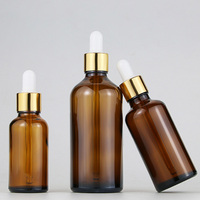 Flacon compte-gouttes doré de luxe en verre ambré de 30 ml, 50 ml, 100 ml pour emballage cosmétique, crème pour cuticules, huile pour le visage et huile capillaire