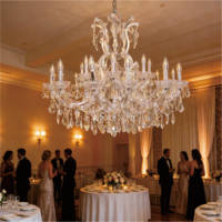 Lustres en cristal transparents à cadre argenté luxueux personnalisés Saixin pour la décoration de plafond d'événements