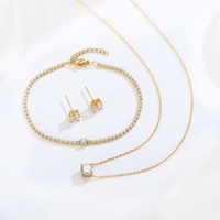 Ensemble de bijoux en zircon classique en acier inoxydable or 18 carats pour femmes boucles d'oreilles et collier pour cadeau d'anniversaire en gros
