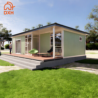Maison conteneur préfabriquée moderne à faible coût avec salle de bain et cuisine, portable, 1 chambre, pour une personne.