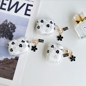 Black and white floral earphones case compatible with for AirPods Pro 2, transparent soft case with pendant - Product Image 1