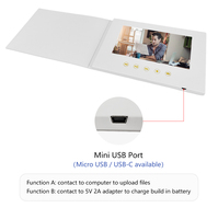 Brochure vidéo blanche A5 avec écran de 7 pouces, mémoire, batterie et bouton qui jouent la carte de livret LCD de livre photo de musique vidéo