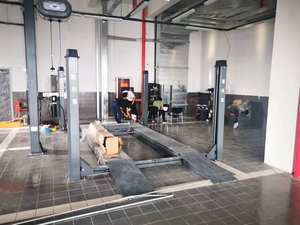 Elevador de Estacionamiento de Cuatro Postes Personalizado con Certificación CE, Capacidad de 12000 lb - Product Image 3