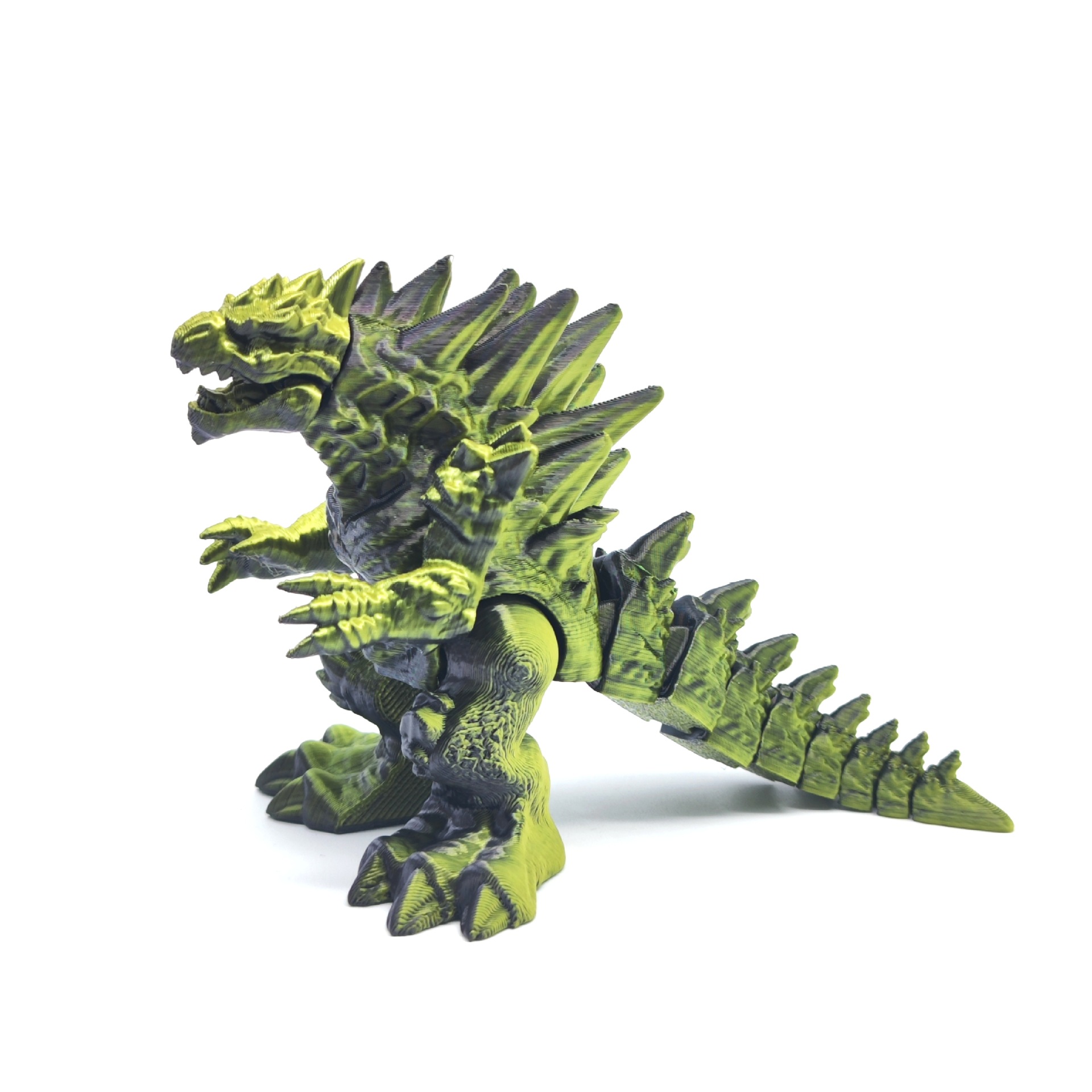 Godzilla negro con efecto dorado escarchado.