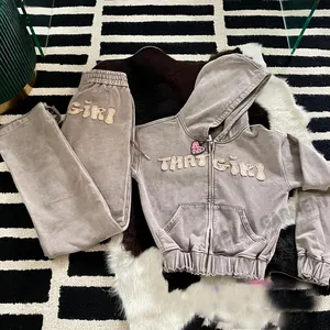 Custom clothing manufacturers new design casual women tracksuit two piece hoodie set and sweatpants distressed patch women set