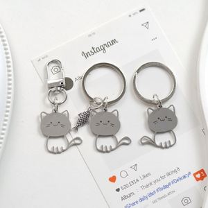 Porte-clés minimaliste chat en métal argenté, pendentif plat chaton, porte-clés de sac, cadeau mignon pour les amoureux des animaux, vente en gros - Product Image 1