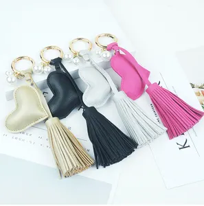 Porte-clés pompon en forme de cœur avec pendentif, accessoire porte-clés en cuir personnalisé, à la mode, vente en gros, pièces