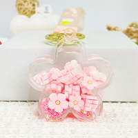 Porte-clés créatif et tendance en acrylique multi-formes avec paillettes liquides, breloque Sakura à pétales de fleurs roses flottants, style dessin animé mignon