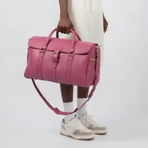 लक्ज़री लेदर डफ़ल बैग लेदर होल्डॉल कैरी ऑल बीच बैग लेदर लगेज कैरी ऑन लगेज गुलाबी ट्रैवल बैग
