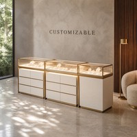 Comptoir de présentation de bijoux modulaire personnalisé, vitrine en verre mat crème, cadre en aluminium bronze, éclairage LED, vente en gros